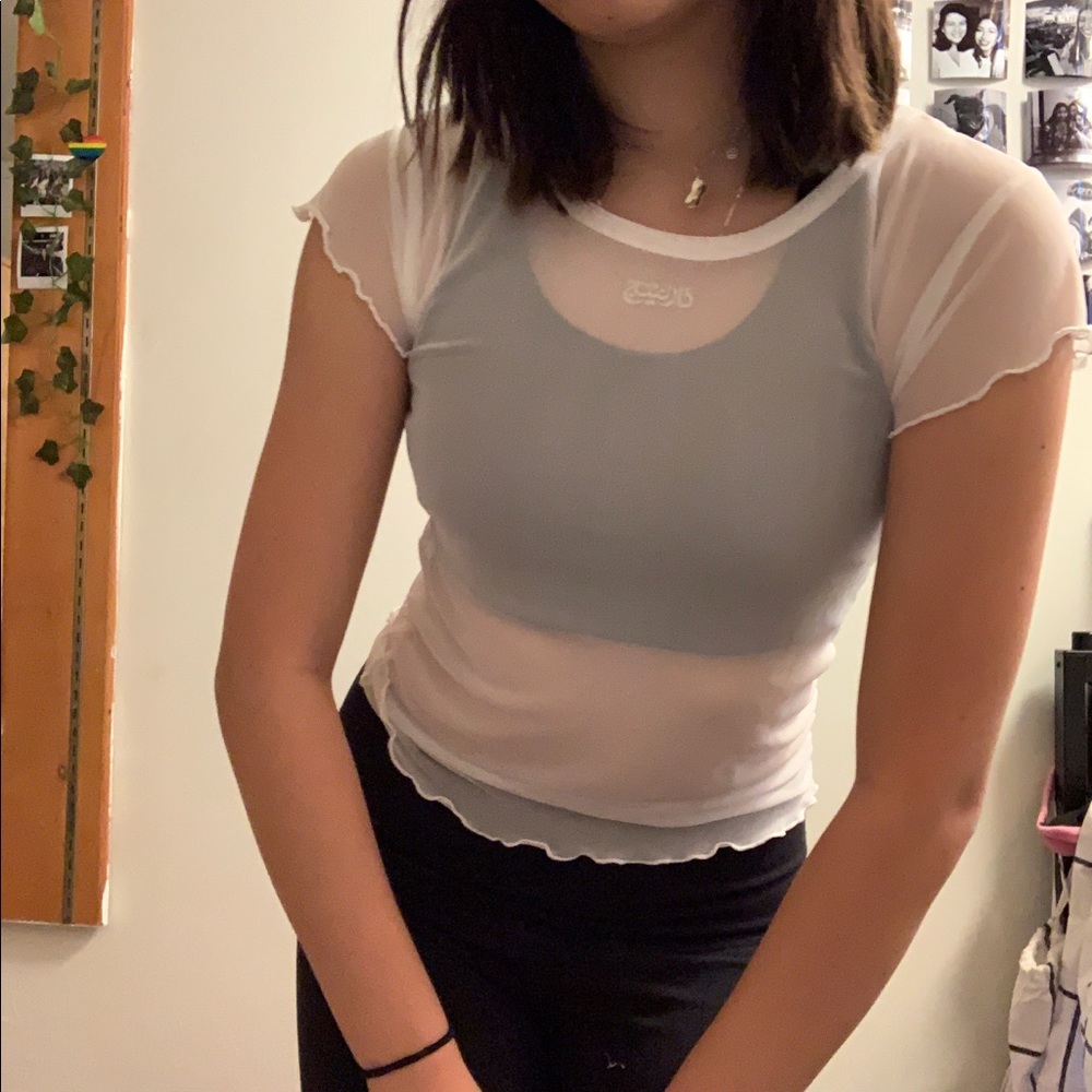 White mesh top, ruffle lettuce hem